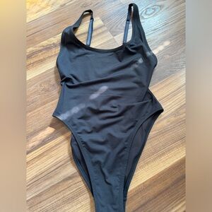 Skim’s one piece swim suit in black size S